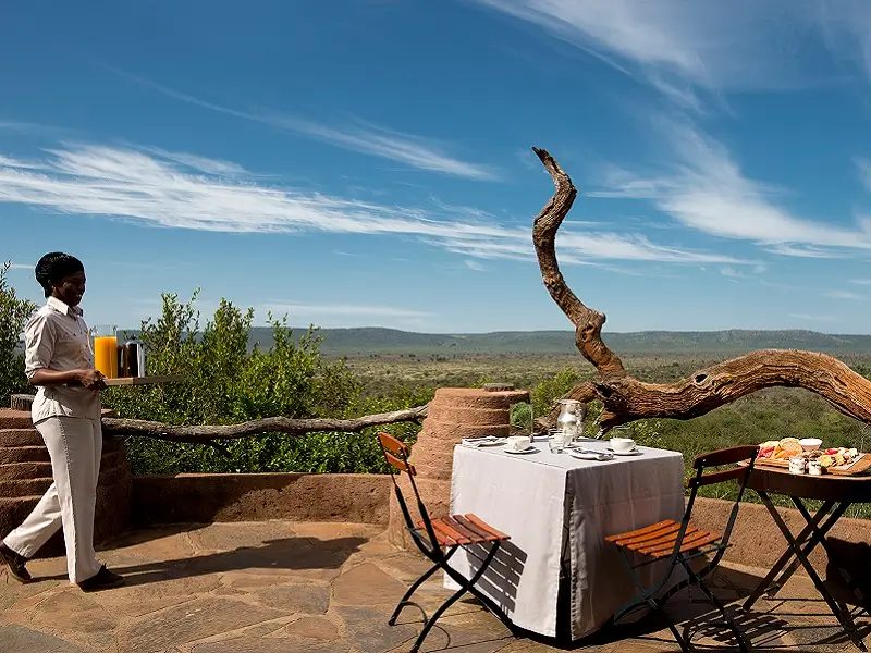 Dining on the deck at Madikwe Safari Lodge Dithaba